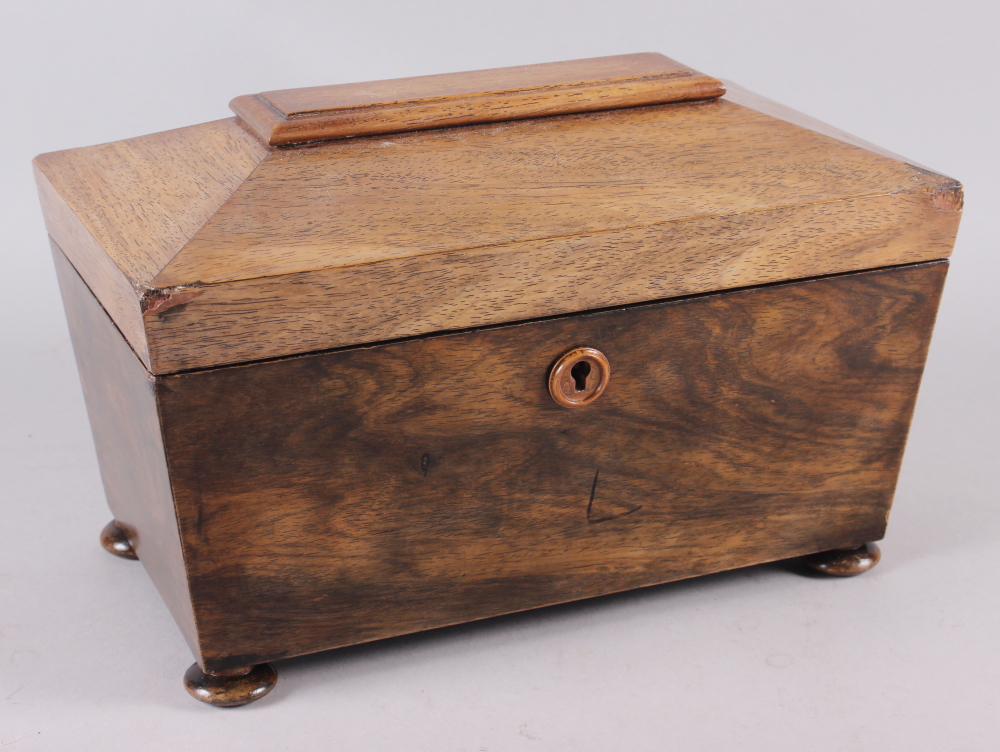 A 19th century sarcophagus tea caddy with central mixing bowl recess, 12" wide