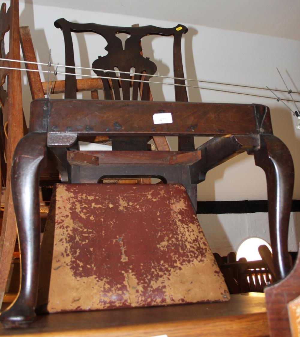 A Cuban mahogany side chair with pierced splat and leather drop-in seat, on cabriole supports