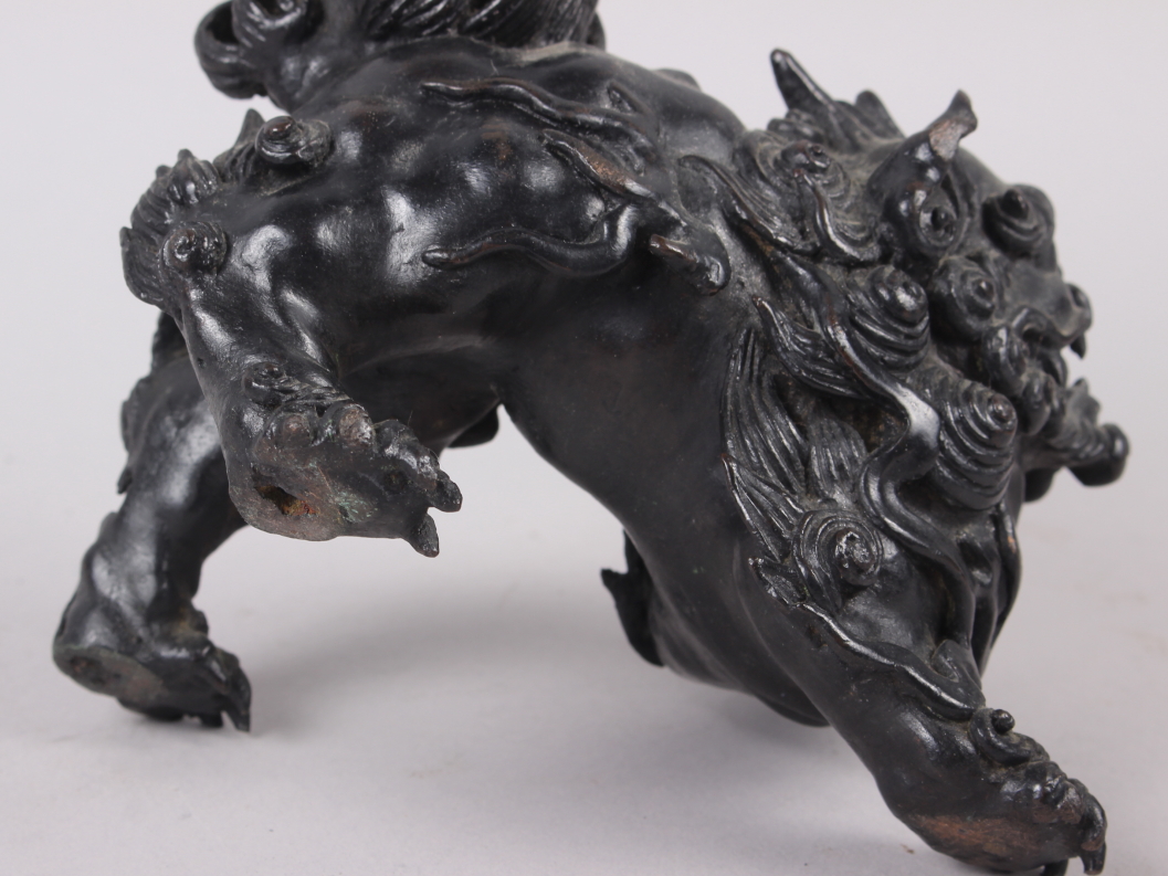 A Chinese bronze model of a lion, 5 1/2" high - Image 3 of 3