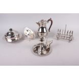 A silver plated muffin dish, a toast rack, a chamber candlestick, etc