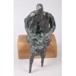 † Robert Clatworthy: a limited edition bronze, "Seated Figure", possibly 4/8, on wooden base, 8 1/2"
