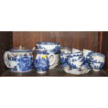 A 19th century porcelain part "Willow" pattern teaset, comprising six teacups, eight tea bowls, nine