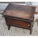 A 17th century design oak box with hinged top and notched edge, 20" wide