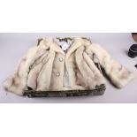 A vintage Harrods cropped fur jacket with mother-of-pearl buttons, in Harrods box