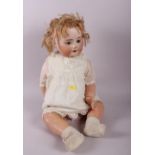 An early 20th century Heuback-Koppelsdorf bisque head bebe doll with composition body, 25" high