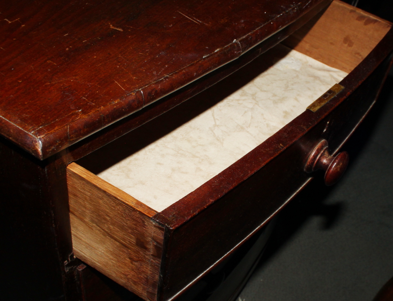 An early 19th century mahogany bowfront chest of two short and three long drawers with turned wooden - Image 2 of 3