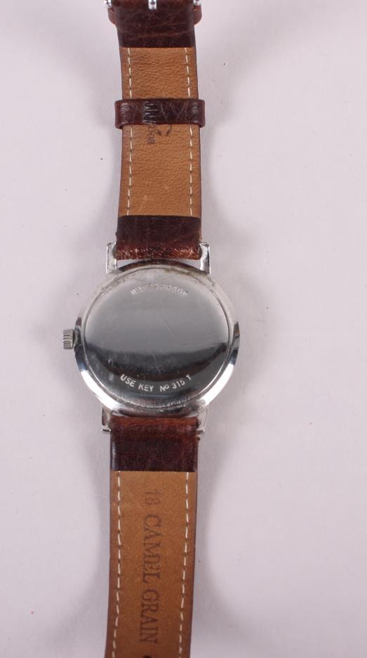 A stainless steel cased Tissot wristwatch with silvered dial and Arabic numerals, on leather strap - Image 3 of 4