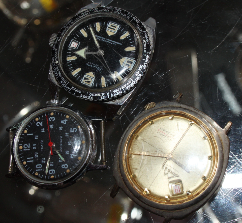 A Lucerne wristwatch, a similar Timex and Leinder (all lacking straps) and a collection of
