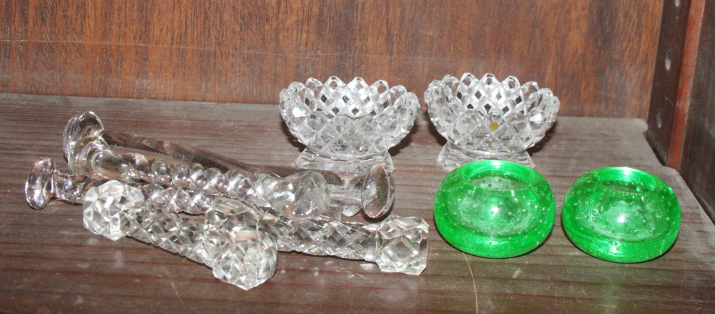 A pair of Whitefriars style candleholders, knife rests and other items