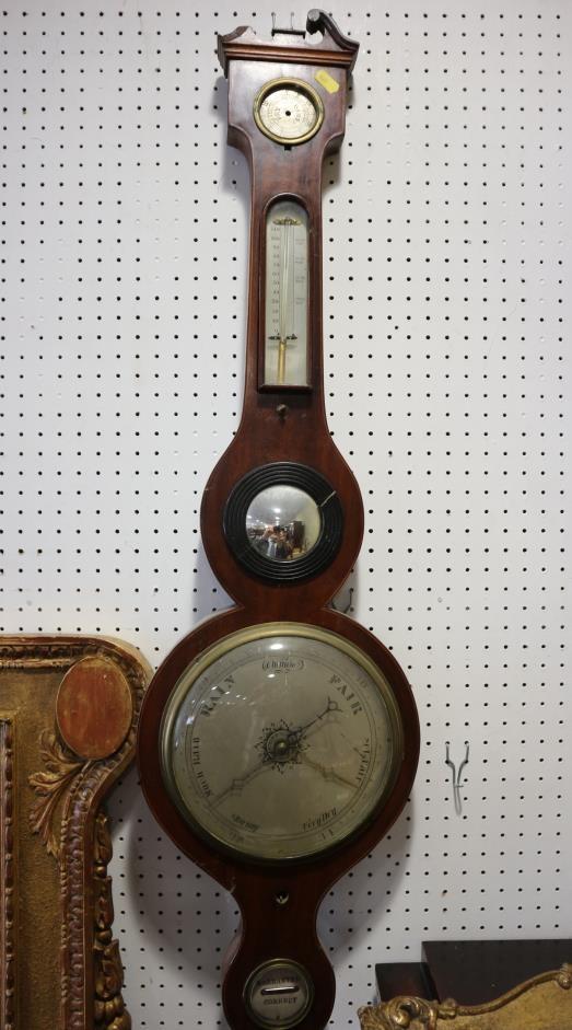 A mahogany cased banjo barometer and thermometer, 38" long (damages to finial)