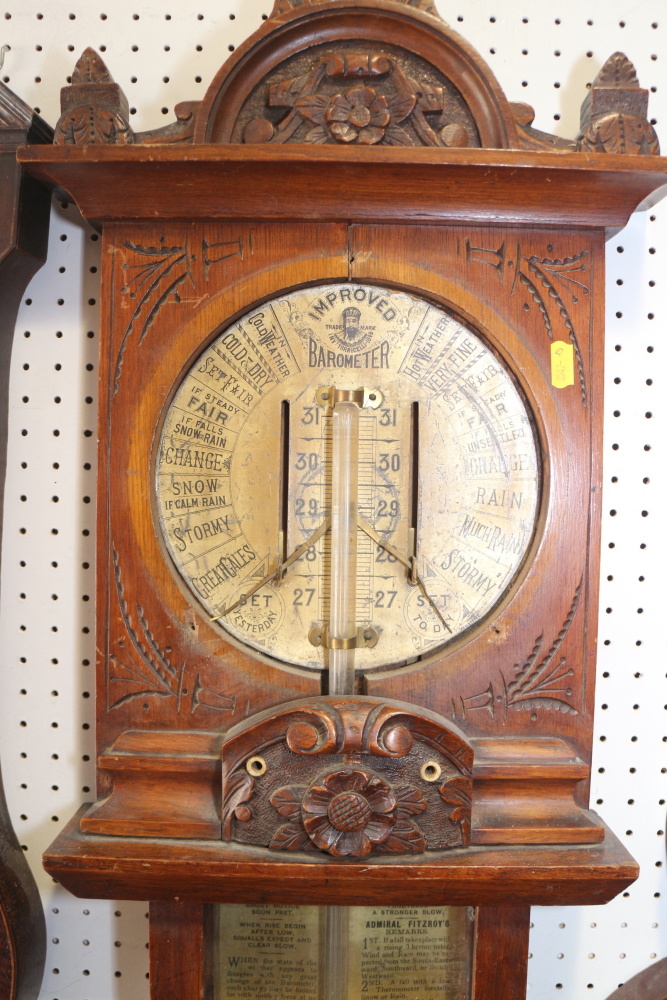 An Admiral Fitzroy barometer, in carved wooden case, 44" high (damages) - Image 2 of 2