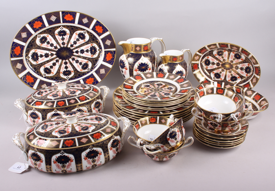 A Royal Crown Derby "Old Imari" 1128 pattern part dinner service, comprising two vegetable tureens