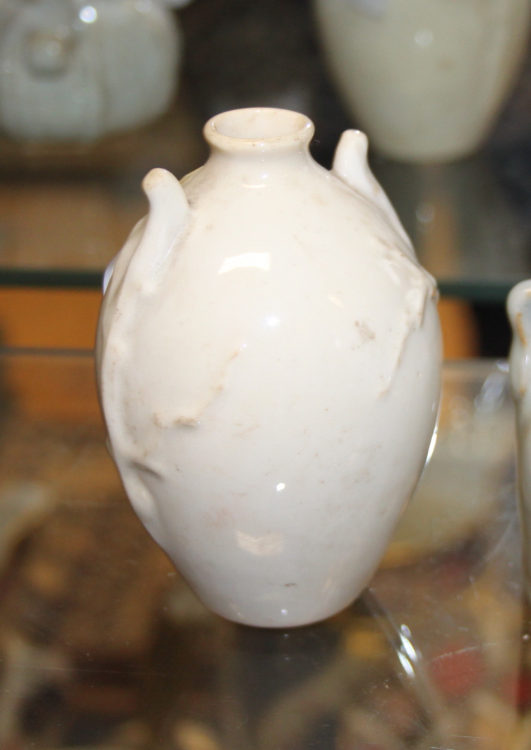 A Chinese pale celadon glazed pot with carrying handles, an urn-shaped vase and two other relief - Image 15 of 27