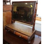 A 19th century swing frame toilet mirror, on plateau base, fitted two drawers, 20" wide, and a black