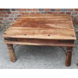 A sheesham low coffee table, on turned supports