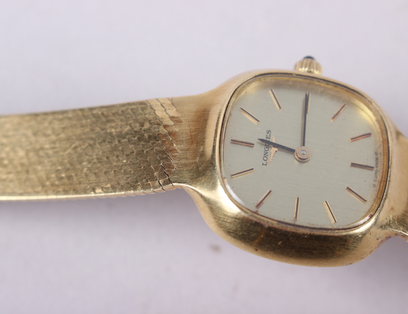 A lady's Longines wristwatch, on flexible yellow metal bracelet, and two other wristwatches - Image 5 of 5