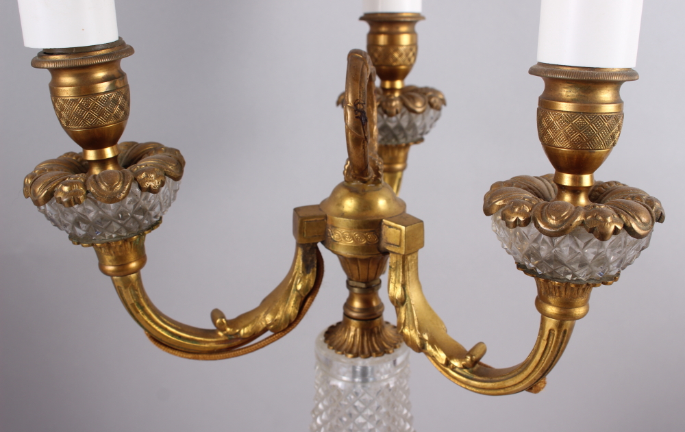 A gilt metal three-light candelabrum with cut glass body fitted electric light - Image 2 of 2