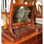 A 19th century mahogany swing frame toilet mirror, on scroll standards and tray base, 20" wide