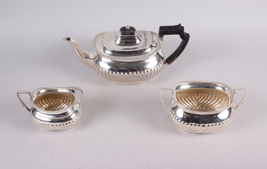 A Georgian design silver plated three-piece teaset