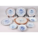 Two Chinese blue and white dragon decorated dishes with six character marks to bases, similar plates