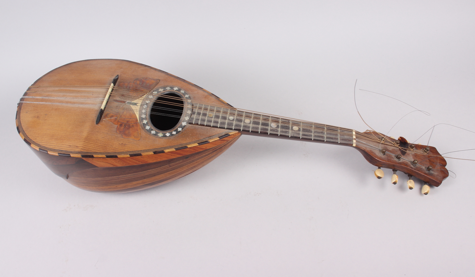 A 19th century Stridente rosewood mandolin, face decorated mother-of-pearl inlay and inlaid - Image 2 of 5