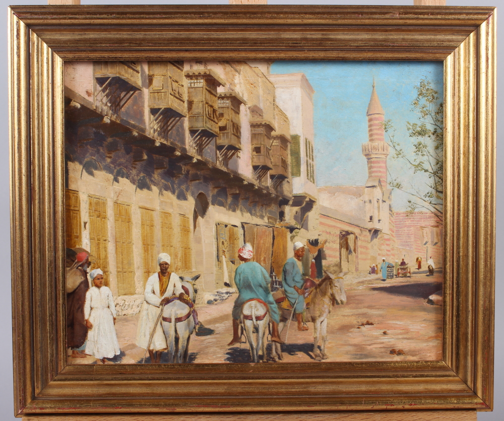 An oil on canvas, "Middle Eastern street scene with donkeys, 8" x 10", in gilt strip frame and an