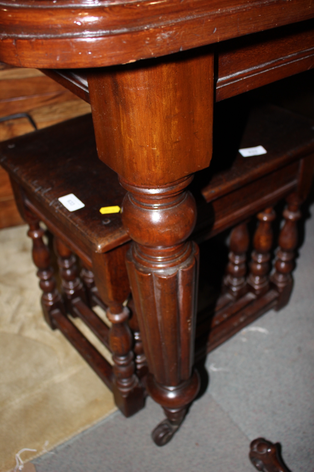 A William IV period mahogany extending table, fitted two leaves, on turned and reeded supports, - Image 2 of 3