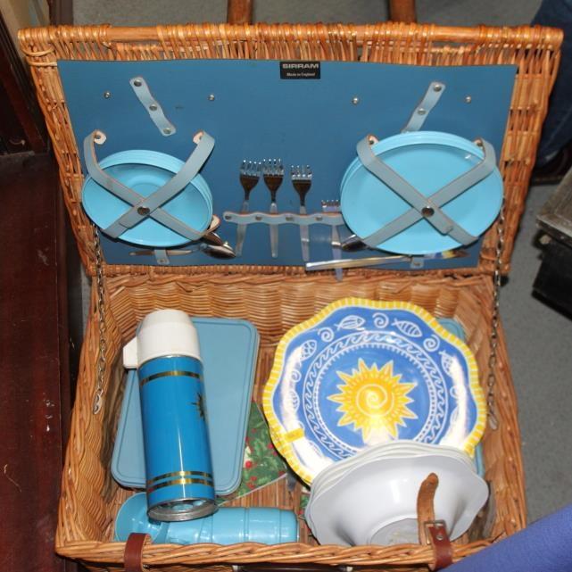 A 1930s Sirran picnic set for four, in canework basket