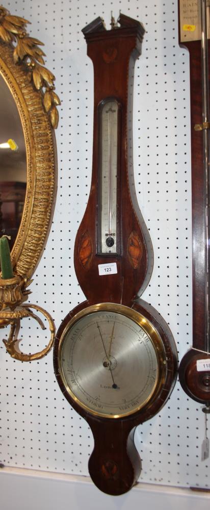 A Georgian syphon tube barometer, in mahogany case inlaid shells, silvered dial inscribed "James