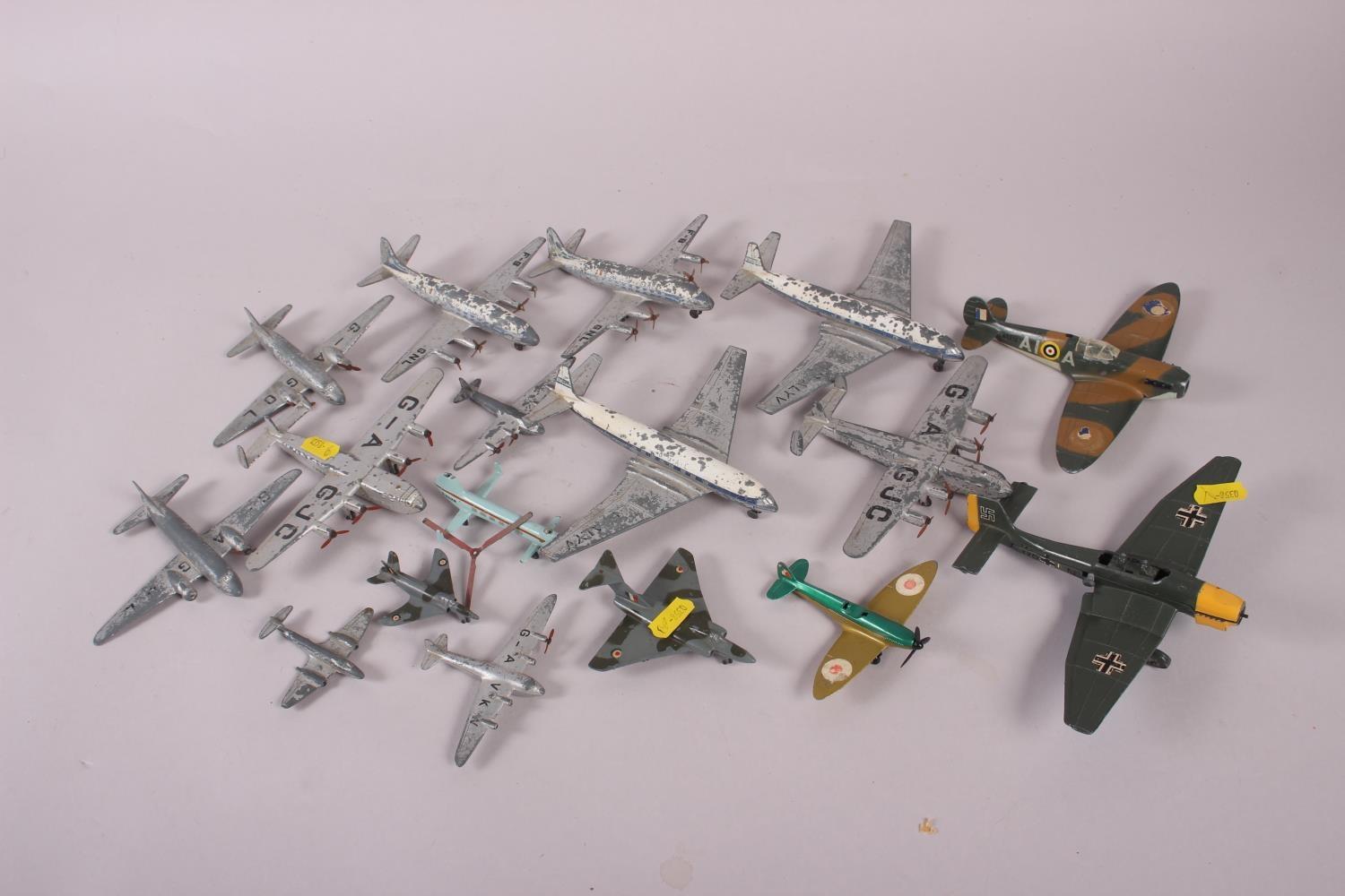 A Dinky Toys die-cast model Junkers plane, a Dinky Toys Spitfire MK II, a Dinky Toys Gloster