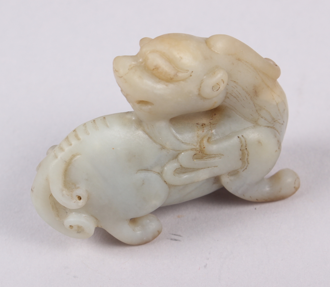 A Chinese carved jade model of a dragon, on hardwood stand, 3 1/4" high overall, and a carved jade - Image 5 of 7