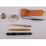 A Parker rolled gold ball point pen, a Watermans gold plated fountain pen with nib marked 18ct, a