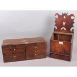 A 19th century mahogany miniature chest of four drawers with hinged top inlaid vase, 17" wide, and a