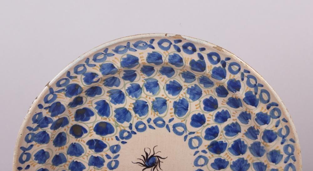 An 18th century Delft plate with all-over leaf and tendril design, 12" dia (rim chips) - Image 2 of 7