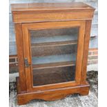 A late 19th century walnut and inlaid pier cabinet enclosed single glazed door, 30" wide x 12"