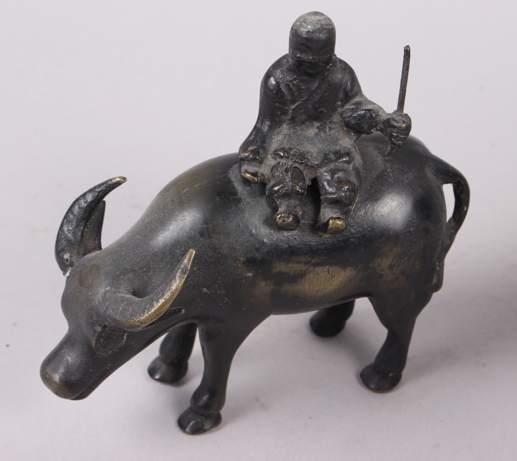 Two Chinese bronze models of figures on the back of buffalos, larger 6 1/4" high - Image 2 of 7