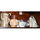 A brown transfer decorated toilet jug, another toilet jug and assorted decorative jugs, etc,