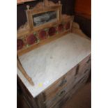 A 19th century marble topped dressing chest, fitted three drawers and tiled back, 42" wide