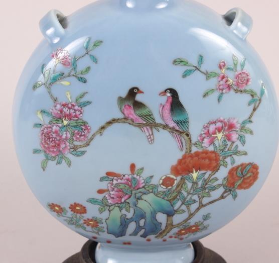 A Chinese moon flask with famille rose decoration of birds and flora, 9 1/2" high, with hardwood - Image 2 of 13