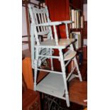 A child's painted high chair, on turned and stretchered supports, and a walnut framed needlepoint