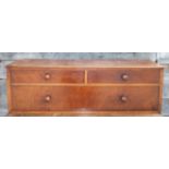 A 19th century mahogany chest of two short and one long drawer with turned wooden knobs, 37" wide