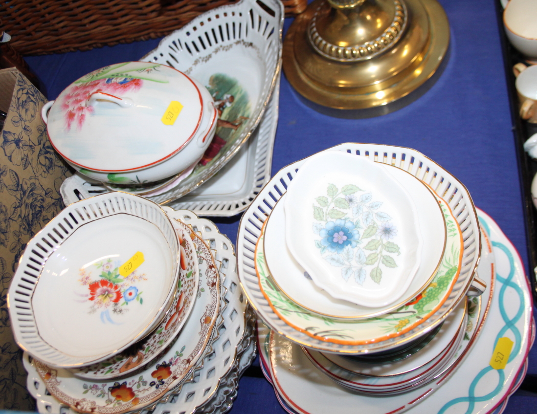 A collection of assorted ribbon plates and other decorative plates