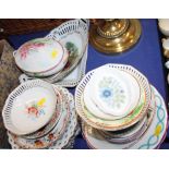 A collection of assorted ribbon plates and other decorative plates