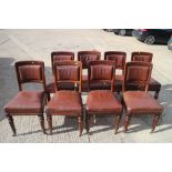 A set of eight 19th century mahogany framed dining chairs with brown leather backs and seats, on