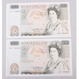 Two Bank of England uncirculated £50 notes with Queen Elizabeth II to the front and Sir