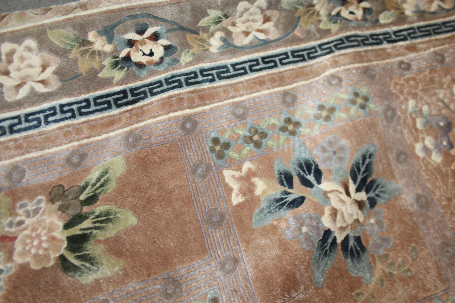 A Chinese silk carpet decorated thirteen floral panels on a beige ground and main floral border - Image 4 of 7