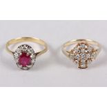 A yellow metal, ruby and diamond cluster ring, 2.9g, size Q, and a yellow metal and diamond dress