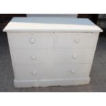 A white painted chest of two short and two long drawers, 42" wide