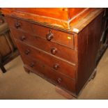 A 19th century oak chest, fitted three long drawers with turned wooden knobs, 38" wide (foot