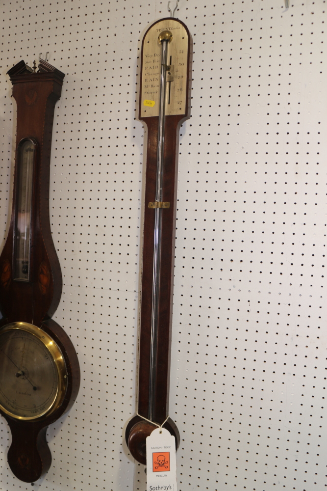 An early 19th century stick barometer, in mahogany case with plain arched top, register plate